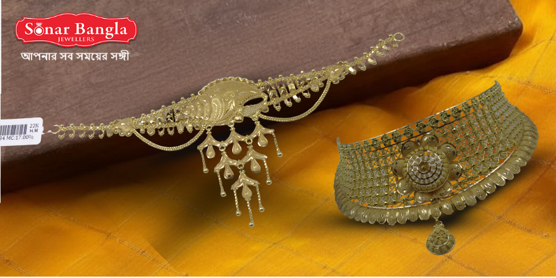 Two exquisite pieces of traditional gold Bengali jewellery: a delicate, elongated necklace/choker and a wide, intricately worked gold choker, displayed on a textured yellow-orange silk cloth.